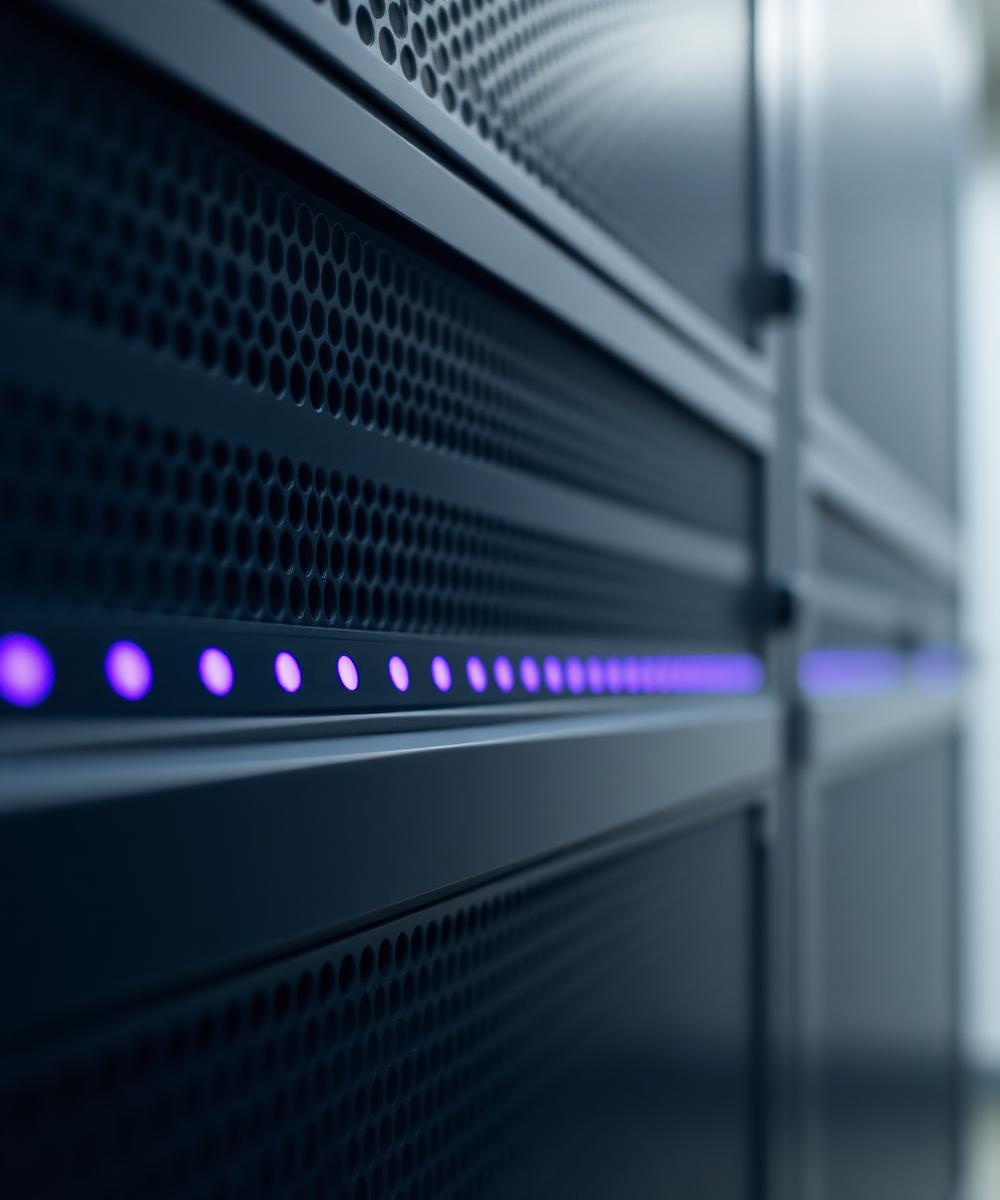 Server rack with lavender indicator lights representing cloud infrastructure